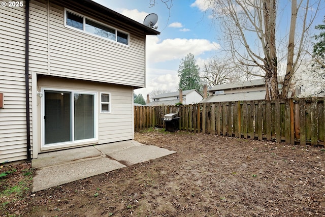view of yard with a fenced backyard and a patio area