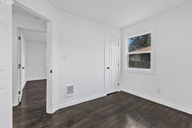 1489 Mckinley Ct, Eugene, OR 97402 - spare room featuring dark wood-style flooring and baseboards