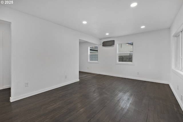 1489 Mckinley Ct, Eugene, OR 97402 - unfurnished room featuring dark wood-style flooring and recessed lighting