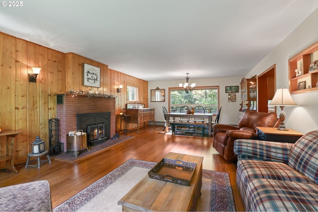 25701 S Morgan Rd, Estacada, OR 97023 - living area featuring wood finished floors, wooden walls, and a chandelier