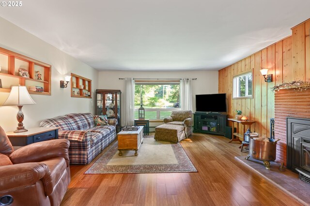 25701 S Morgan Rd, Estacada, OR 97023 - living area with plenty of natural light, wooden walls, and wood finished floors
