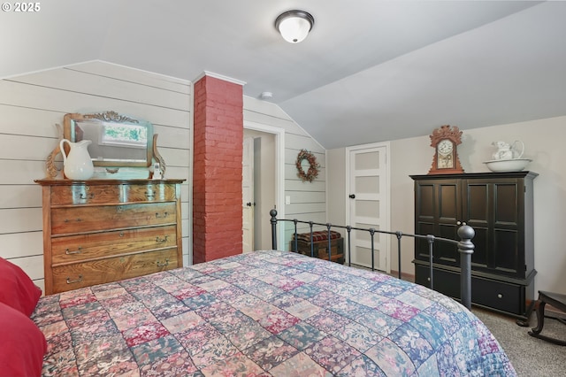 25701 S Morgan Rd, Estacada, OR 97023 - bedroom with vaulted ceiling, carpet floors, and wood walls