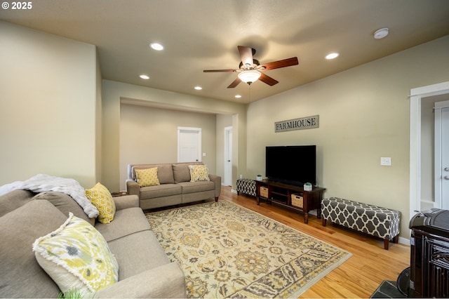 living area with light wood-style floors, recessed lighting, and ceiling fan