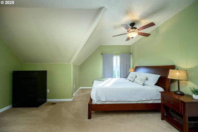 bedroom featuring lofted ceiling, carpet flooring, ceiling fan, and baseboards