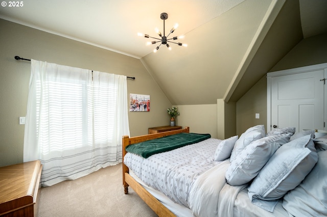 carpeted bedroom with lofted ceiling and an inviting chandelier