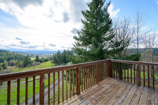 wooden terrace featuring a mountain view