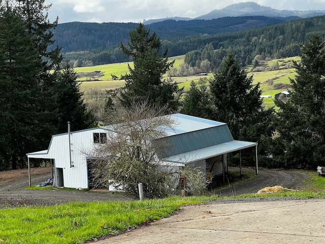 property view of mountains with a forest view