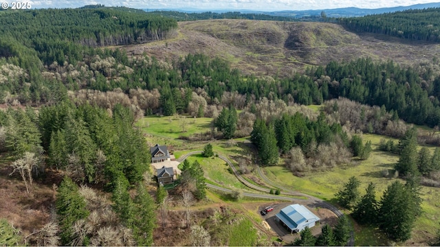 aerial view featuring a forest view