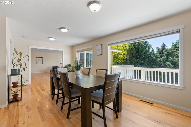 611 Summit Ridge Dr, The Dalles, OR 97058 - dining area featuring light wood-style floors and baseboards