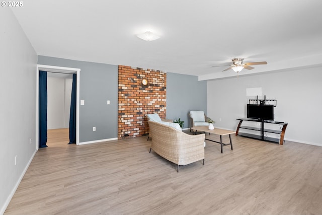611 Summit Ridge Dr, The Dalles, OR 97058 - living area with ceiling fan, light wood-style floors, and baseboards