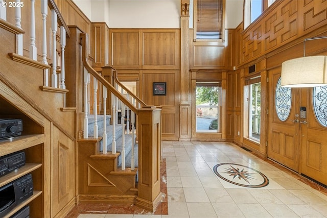 35001 NE 91st Ave, La Center, WA 98629 - foyer entrance with a decorative wall, stairs, and a high ceiling