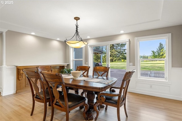 35001 NE 91st Ave, La Center, WA 98629 - dining space with light wood-style flooring, a wainscoted wall, a decorative wall, and recessed lighting