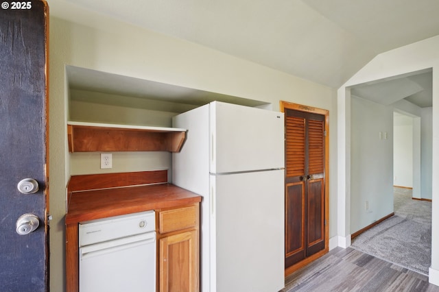 4314 SE 72nd Ave, Portland, OR 97206 - kitchen featuring freestanding refrigerator, open shelves, wood finished floors, lofted ceiling, and dark countertops