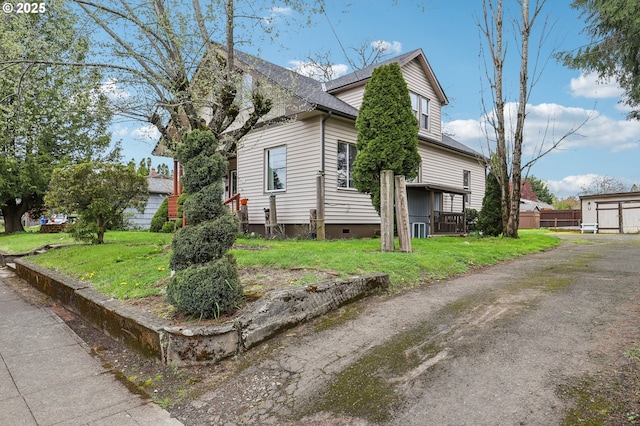 4314 SE 72nd Ave, Portland, OR 97206 - view of side of property with a lawn and crawl space