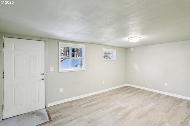 4314 SE 72nd Ave, Portland, OR 97206 - entrance foyer featuring light wood-style flooring and baseboards