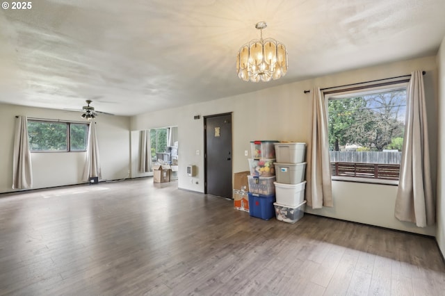 4314 SE 72nd Ave, Portland, OR 97206 - unfurnished dining area with wood finished floors, a chandelier, and a ceiling fan