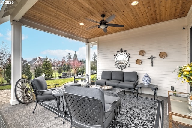 view of patio featuring ceiling fan and an outdoor living space