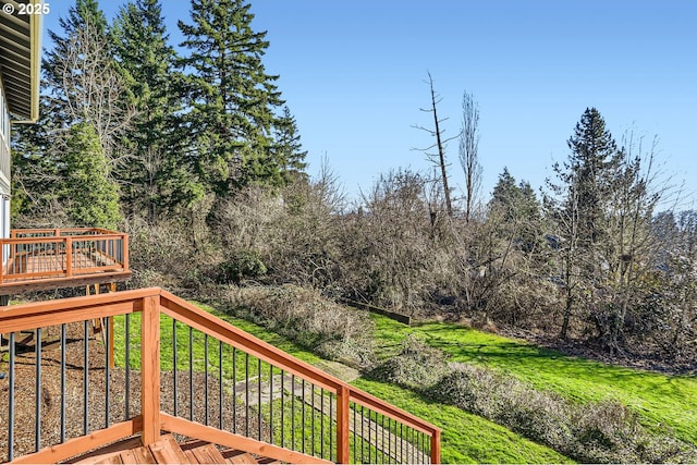 deck featuring a lawn