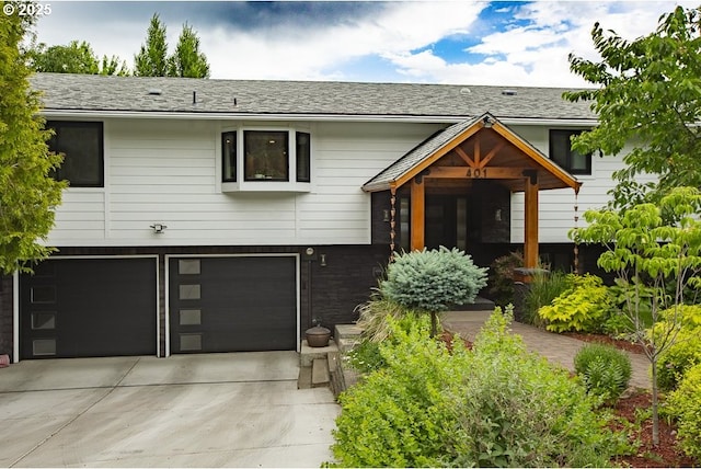 401 Walnut St, La Grande, OR 97850 - view of front of house featuring concrete driveway and a garage