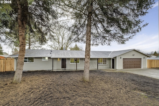 single story home featuring a garage