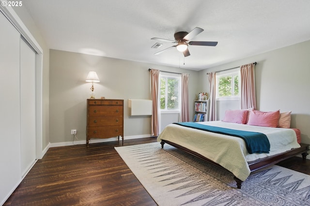 10410 SE 55th Ave, Milwaukie, OR 97222 - bedroom with wood finished floors, baseboards, a closet, and a ceiling fan