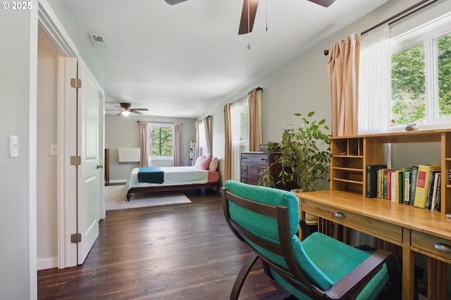 10410 SE 55th Ave, Milwaukie, OR 97222 - bedroom featuring dark wood finished floors, baseboards, and ceiling fan
