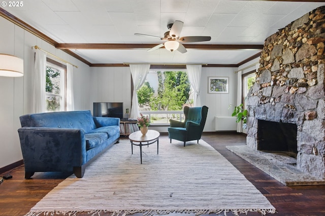 10410 SE 55th Ave, Milwaukie, OR 97222 - living area featuring crown molding, wood finished floors, a ceiling fan, and a fireplace