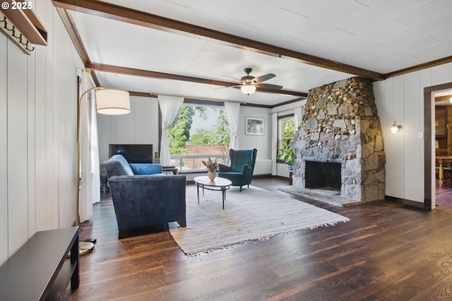 10410 SE 55th Ave, Milwaukie, OR 97222 - living room with beam ceiling, ceiling fan, wood finished floors, a fireplace, and baseboards