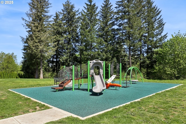 community play area with a lawn