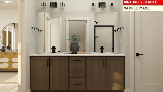 full bathroom with double vanity and a sink