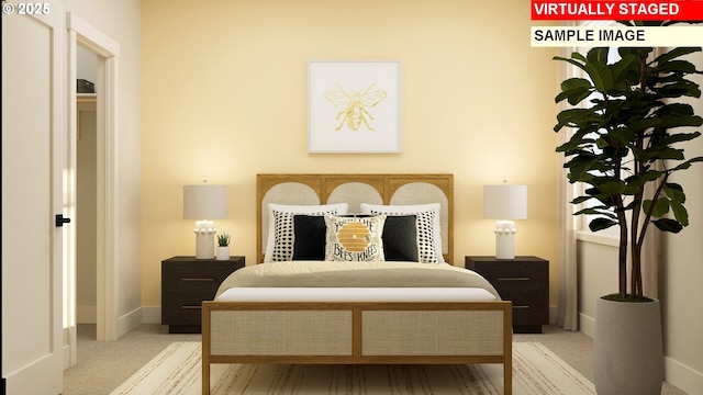 carpeted bedroom with baseboards