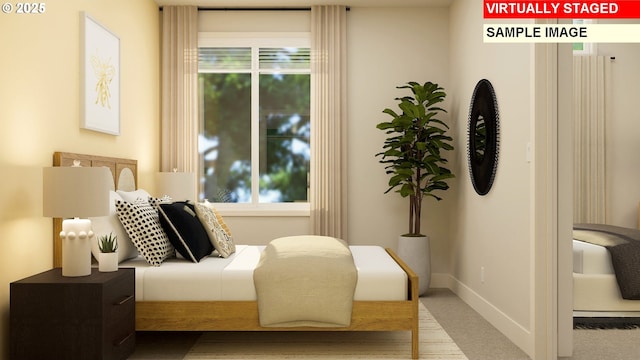 carpeted bedroom featuring baseboards and multiple windows