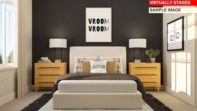 carpeted bedroom with baseboards