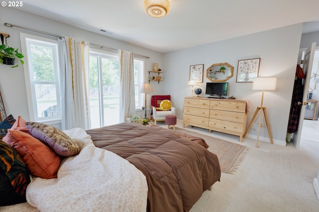 12545 SW Fairfield St, Beaverton, OR 97005 - bedroom featuring carpet floors, baseboards, and access to outside