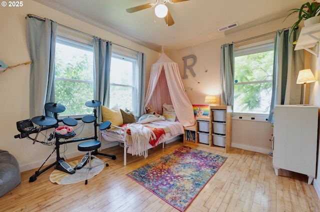 12545 SW Fairfield St, Beaverton, OR 97005 - bedroom featuring hardwood / wood-style flooring, baseboards, and ceiling fan