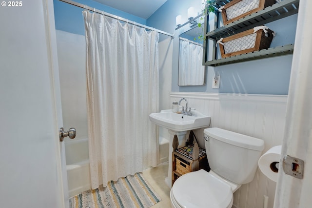 12545 SW Fairfield St, Beaverton, OR 97005 - full bathroom featuring wainscoting, shower / bathtub combination with curtain, and toilet