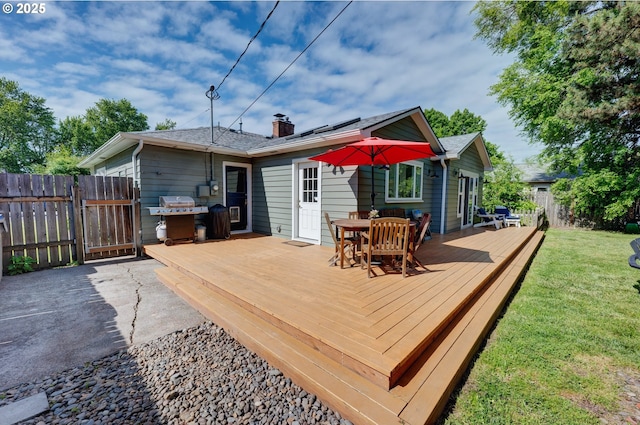 12545 SW Fairfield St, Beaverton, OR 97005 - wooden terrace featuring outdoor dining space, a grill, and a gate