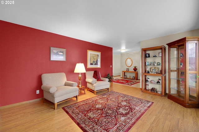 living area featuring light hardwood / wood-style floors