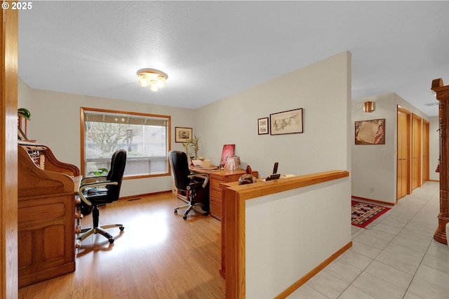 home office featuring light hardwood / wood-style flooring