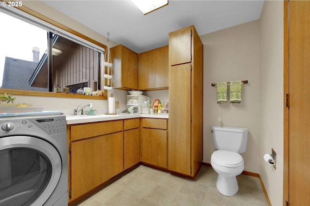 laundry room with washer / dryer and sink