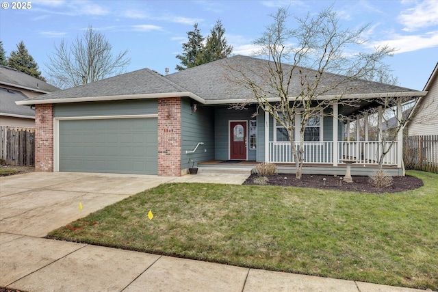 single story home featuring a garage, a front yard, and covered porch