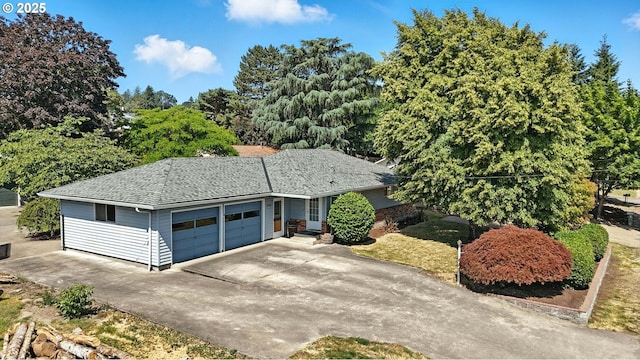 3216 Oakcrest Dr, Forest Grove, OR 97116 - ranch-style house featuring driveway, an attached garage, and roof with shingles