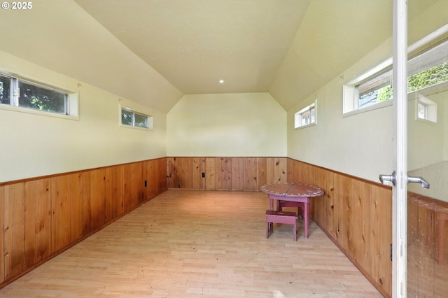 3216 Oakcrest Dr, Forest Grove, OR 97116 - hall with wainscoting, wooden walls, wood finished floors, and vaulted ceiling