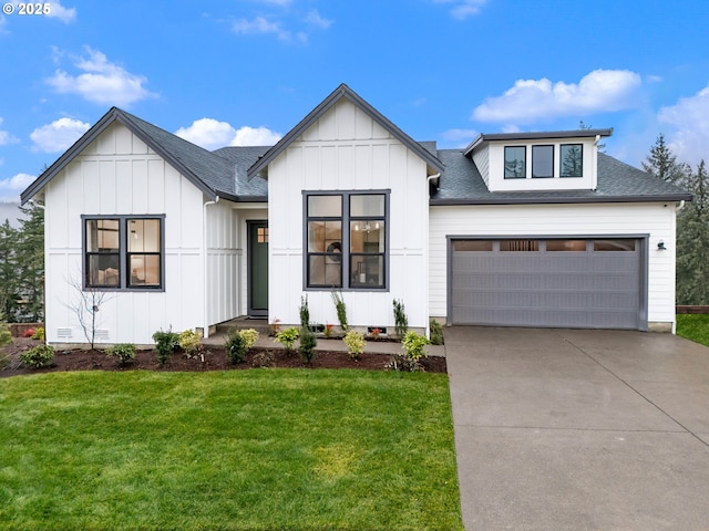 modern farmhouse with a garage and a front lawn