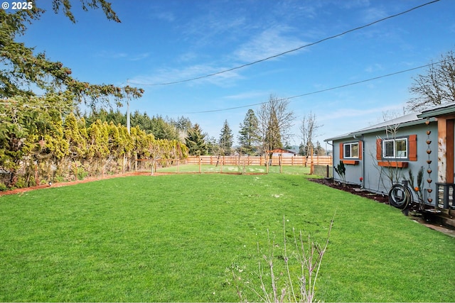 view of yard featuring fence