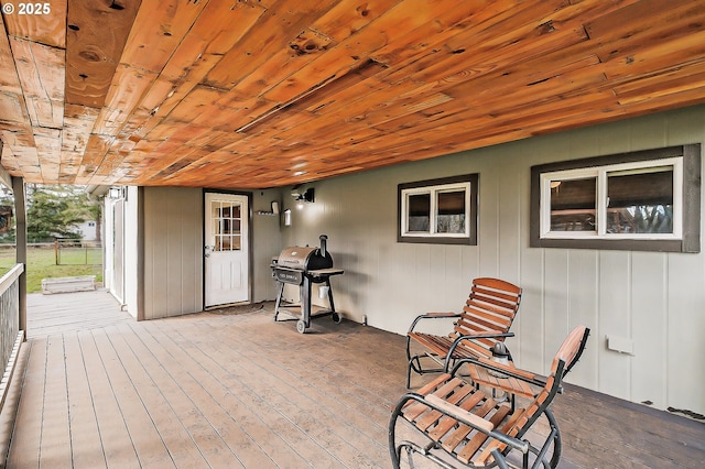 wooden deck with area for grilling