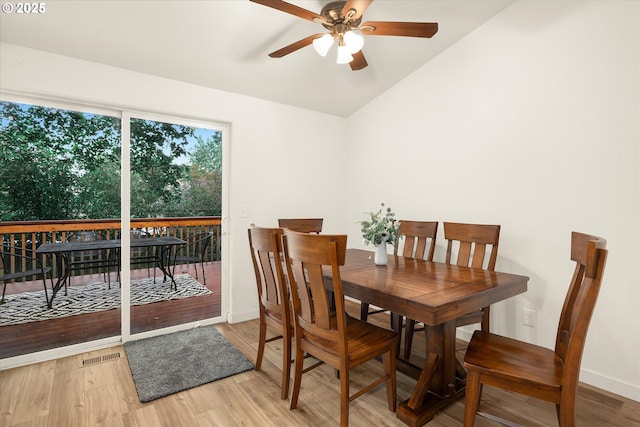 1573 SE 67th Ave, Hillsboro, OR 97123 - dining space featuring lofted ceiling, a ceiling fan, light wood-style floors, and baseboards