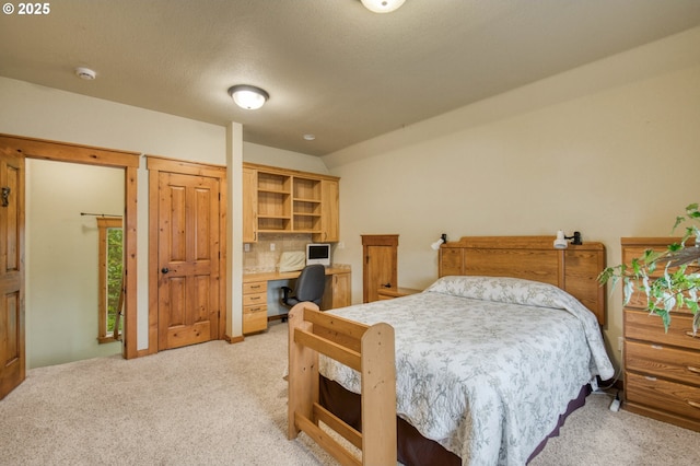 2064 NW 33rd St, Lincoln City, OR 97367 - bedroom featuring light colored carpet, an office area, and vaulted ceiling