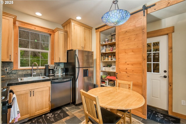 2064 NW 33rd St, Lincoln City, OR 97367 - kitchen with stainless steel microwave, black range with electric cooktop, dishwashing machine, a sink, and tile countertops