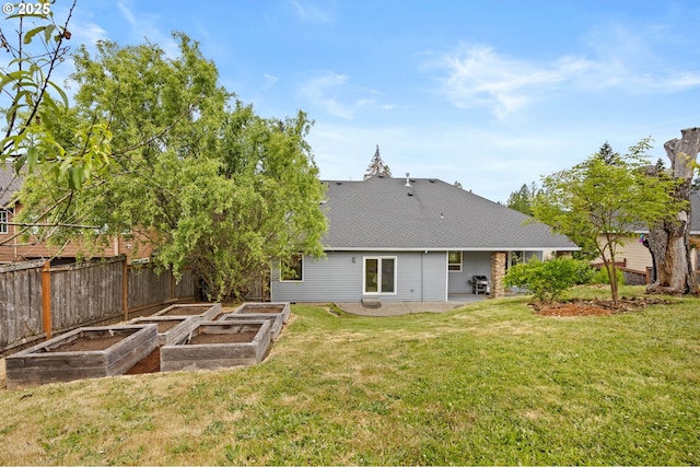 6420 SE Dunbar Dr, Portland, OR 97236 - back of house with a garden and a patio area